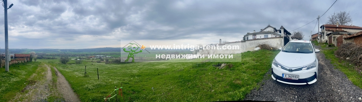 №4078 Панорамен селски имот в регулация с огромна площ в началото на село Родопи, Хасково!